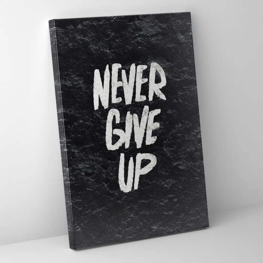 Seitenansicht einer schwarzen Motivations-Leinwand mit weißer Typografie